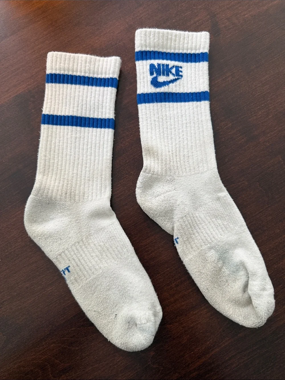 4 pairs Nike White Crew Athletic Socks with Red and Blue Accents heel to toe 8”.